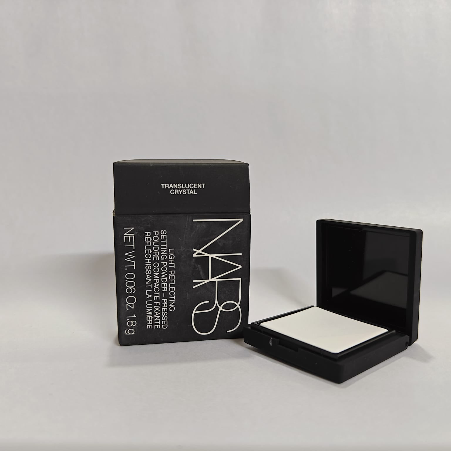 NARS Light Reflecting Setting Powder Pressed Mini - Crystal (1.8gms)