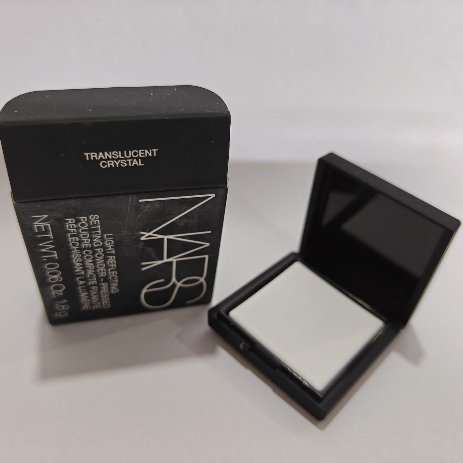 NARS Light Reflecting Setting Powder Pressed Mini - Crystal (1.8gms)